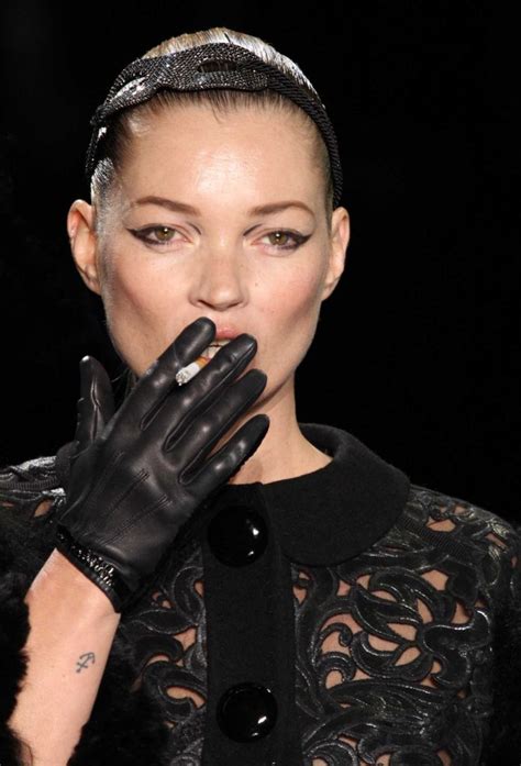 Kate Moss Brings Back The Smoking Jacket At Paris Fashion Week .